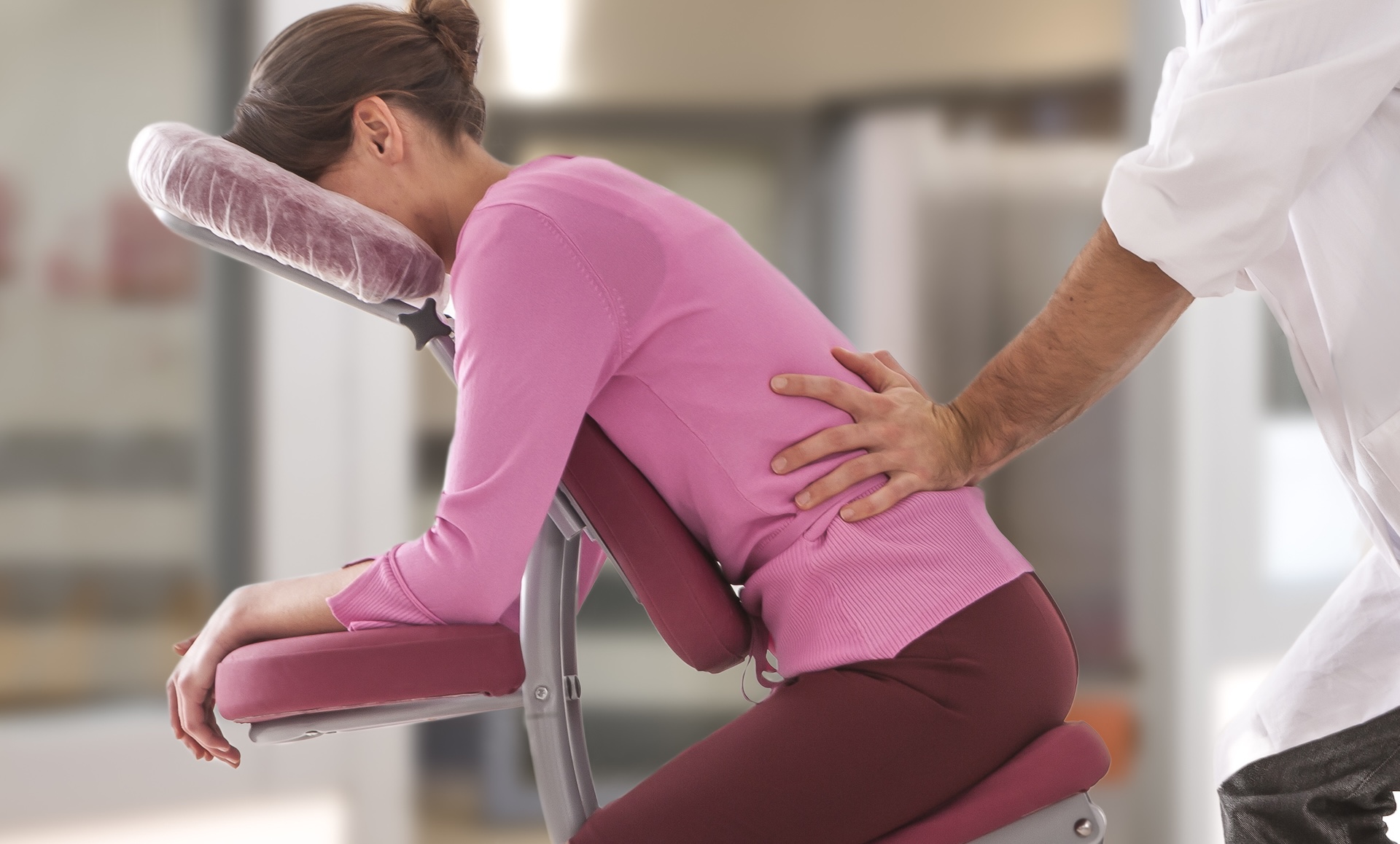 Employee receiving an on-site seated back massage